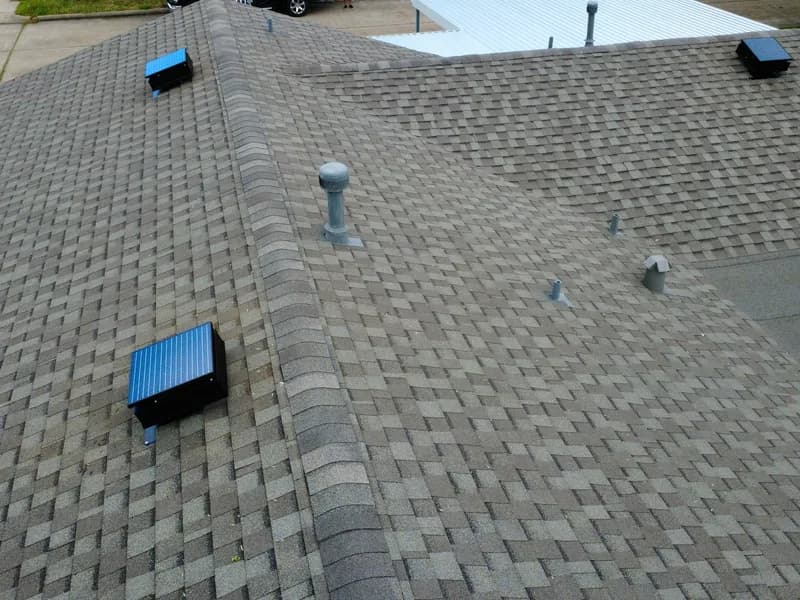 Drone view of solar attic fan on the back slope